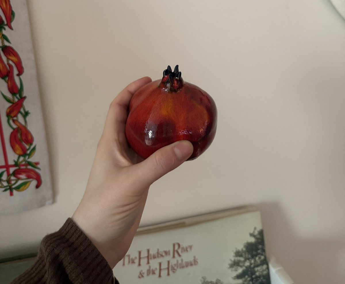My aunt saw this ceramic pomegranate and said “is that a hash pipe”