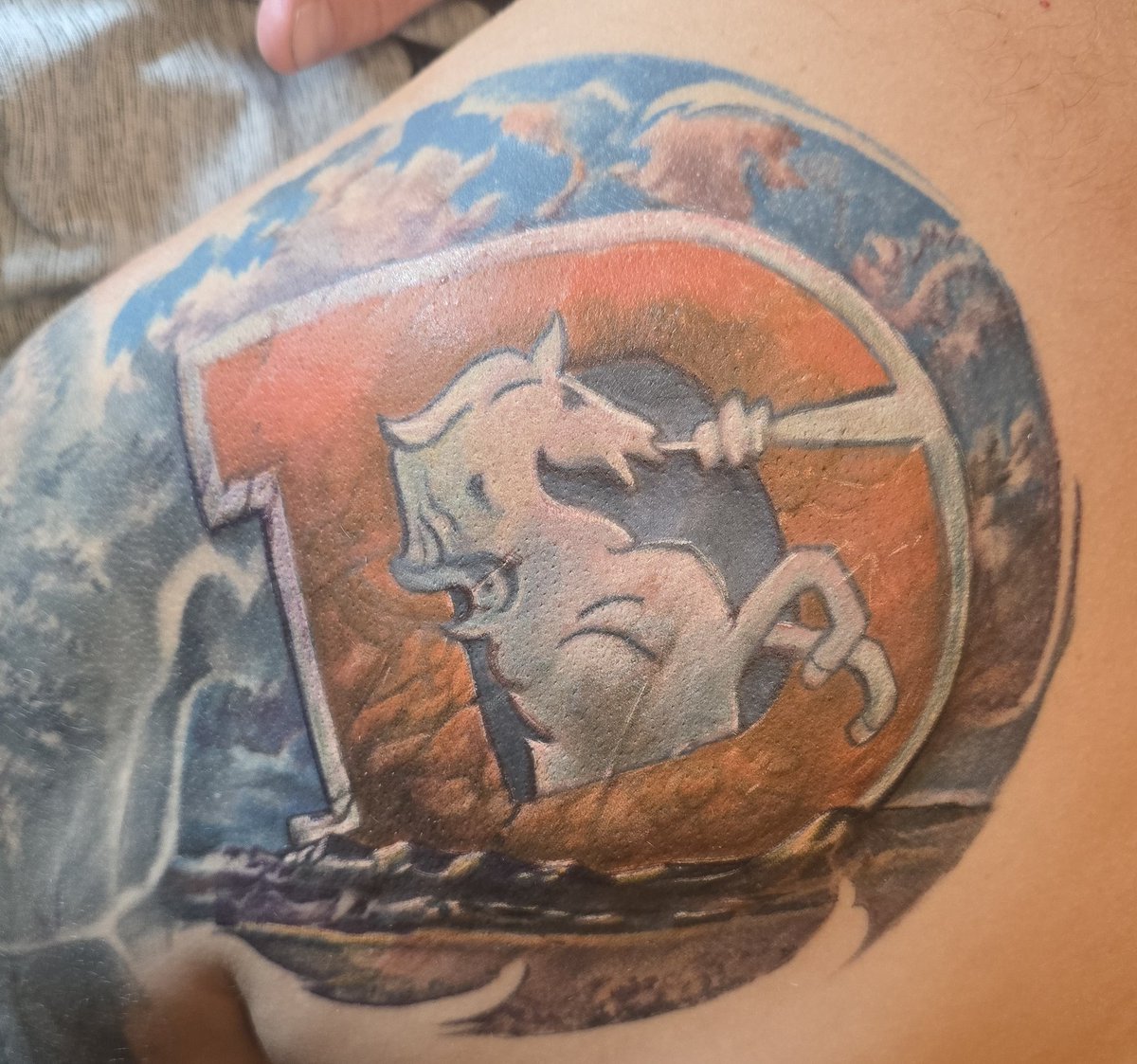 FKorpi's tweet photo. I can't put into words how good this guy is at tattoos, love this #BroncosCountry https://t.co/PJ2vB3bbKb