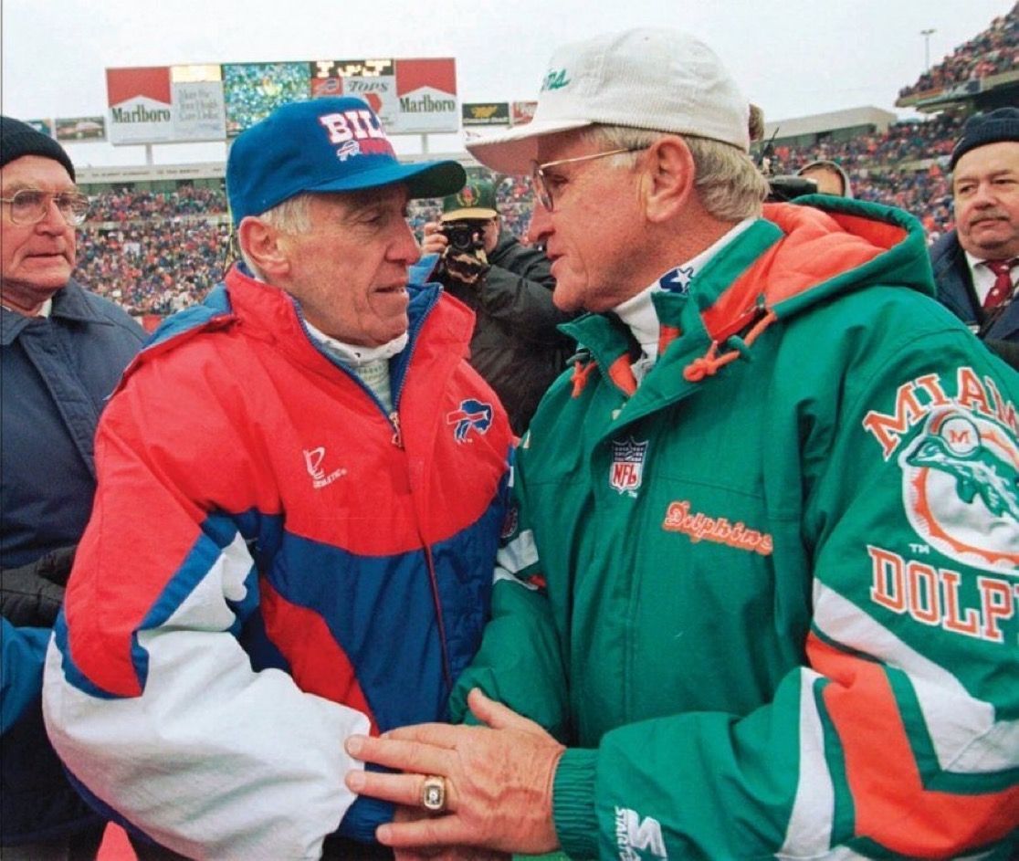 The jackets, hats, and the ads in the background. American society peaked hard in the 90’s
