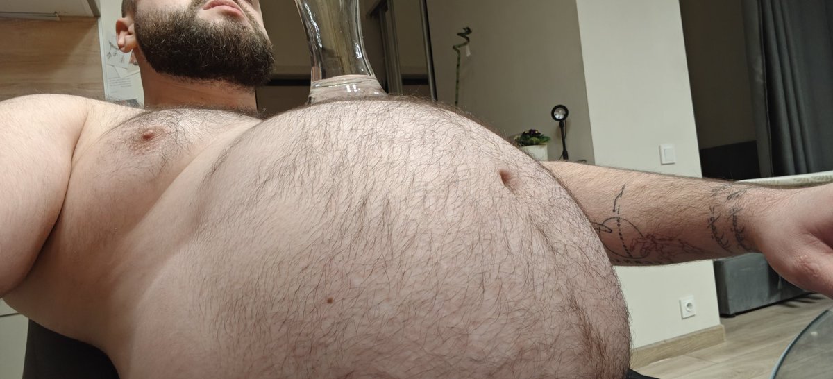 My belly is the best damn beer holder in the world Warm. Soft. Rock-solid. The beer approves 😏🍻 #HugeJohnny #BeerBelly #GutLife #Bearmen #Bearbelly #bigbelly #beer