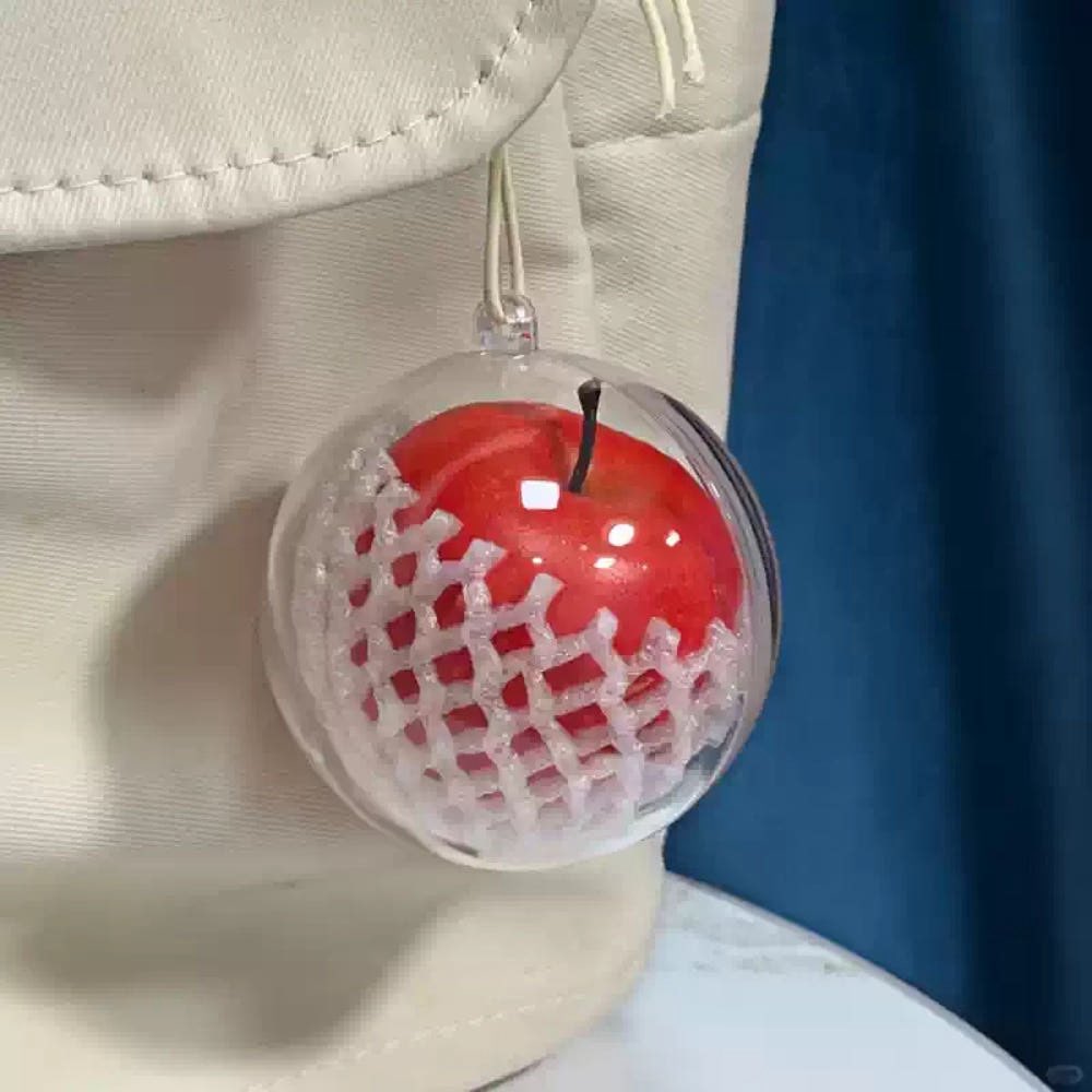aesttics's tweet photo. apple keychain https://t.co/CpM6RlI6GG
