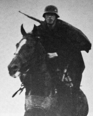 German soldier riding a horse during the invasion of Greece, 1941