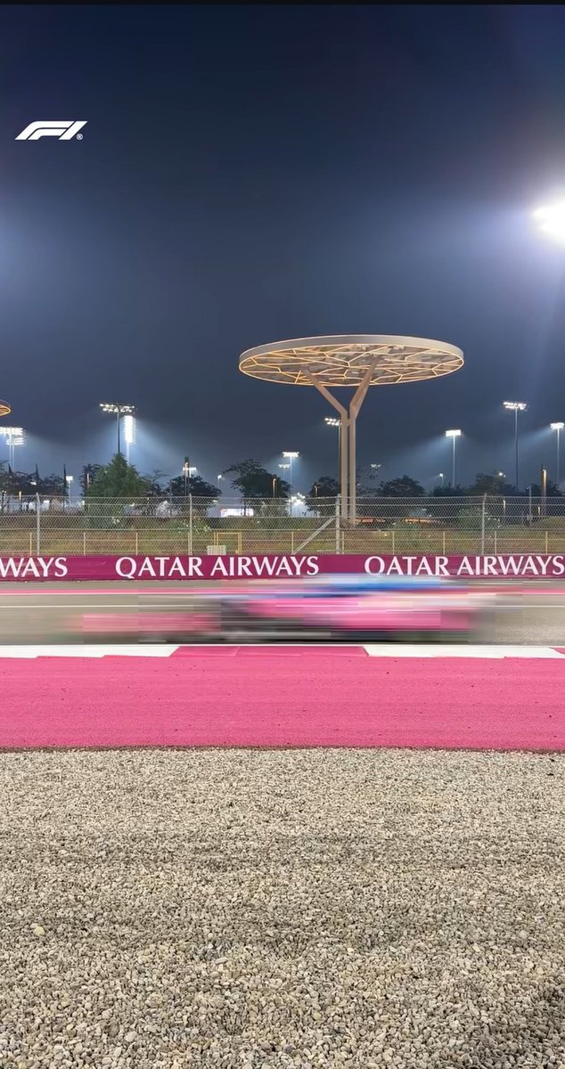 Triple5999's tweet photo. 🏎️Pink blur at full speed. My capture from the #Formula1ScreenshotChallenge. That #BWT looks even better under the lights.✨#f1 https://t.co/teSlpkhbex