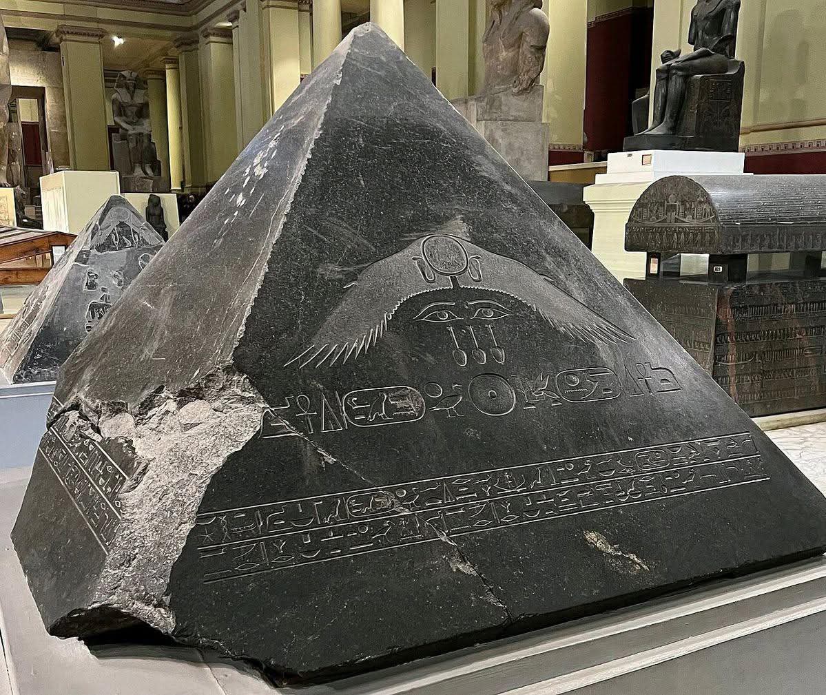 🔥 The Stone That Once Touched the Sun

High above the golden sands of ancient Egypt, the very tip of a pyramid once caught the first light of dawn. Today, that same stone rests quietly inside a museum hall — but its story still shines across thousands of years.

This massive