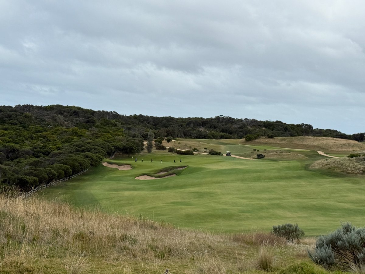 Top100Rick's tweet photo. The Gunnamatta Course
At The National Golf Club
Tom Doak - 2019
#12 in Australia
Private 

It’s actually insane how good the land is down on the Mornington Peninsula is. Both the Gunnamatta and St Andrews Beach are on golf sites that are what dreams are made of. 

At Gunna, Tom Doak inherited a Peter Thomson course that many thought didn’t use the land well. Tom went in and removed man made features, added width, and brought nature back into the golf. 

Now it’s truly spectacular. 

The course runs up and down parallel the coast and is closer to a traditional Links routing, mostly in the direction to and from the clubhouse. So when the wind is a beast, which it was when we played, you get it multiple holes in a row.

The use of wide fairways and angles is once again used perfectly. With the perfect firmness of the turf, shots can bound over the green if not coming from the right angle. 

Tom once again showed restraint with his bunkering. There is almost always a way to avoid the sand and the forced carries are rare. Knowing it’s a very windy site, he made the course very playable. But that doesn’t mean easy, the bunkers are deep and the green slope is dangerous. 

The National has 4 golf courses and the word is all are world class. Having only played one, I agree so far!