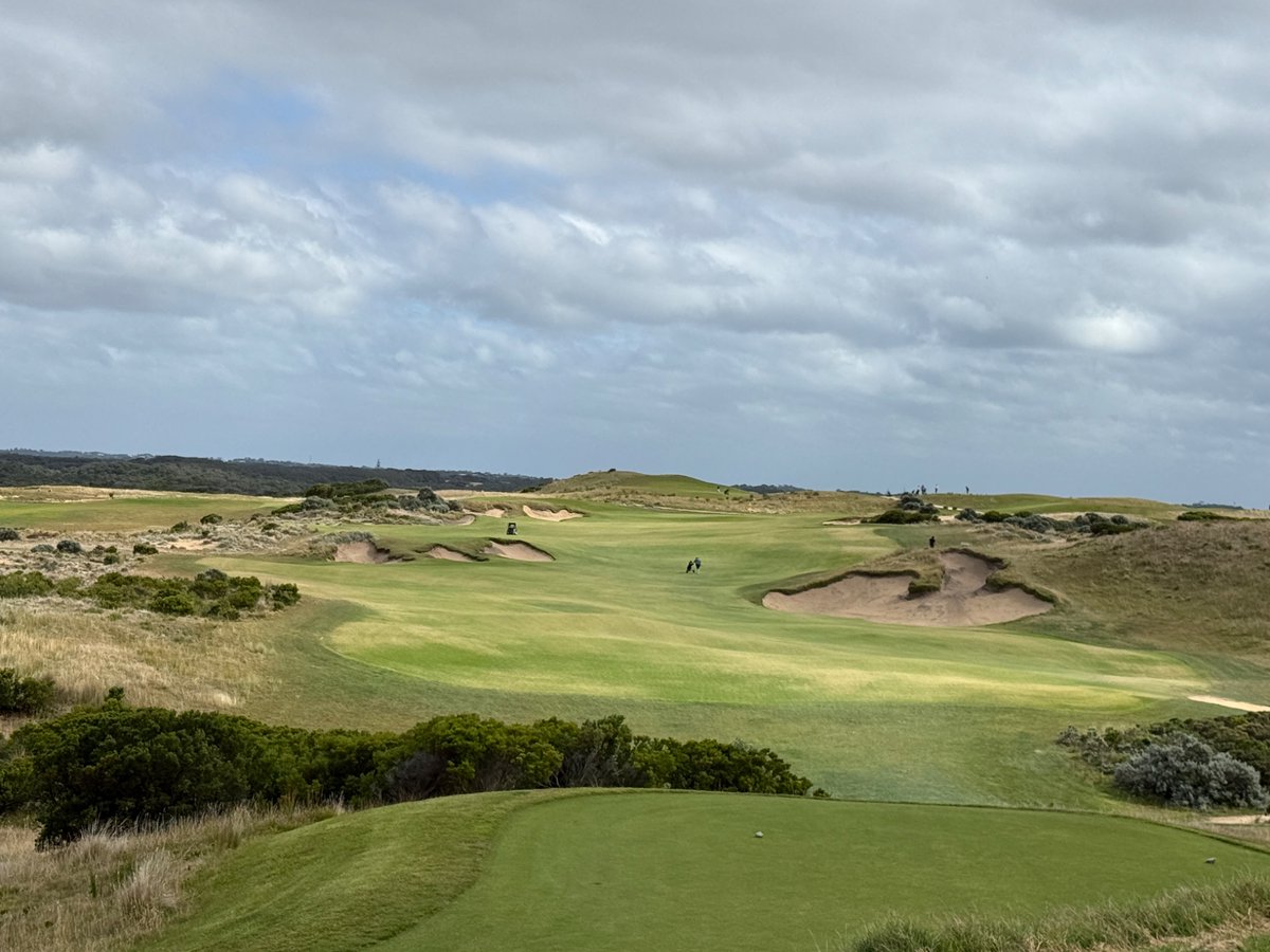 Top100Rick's tweet photo. The Gunnamatta Course
At The National Golf Club
Tom Doak - 2019
#12 in Australia
Private 

It’s actually insane how good the land is down on the Mornington Peninsula is. Both the Gunnamatta and St Andrews Beach are on golf sites that are what dreams are made of. 

At Gunna, Tom Doak inherited a Peter Thomson course that many thought didn’t use the land well. Tom went in and removed man made features, added width, and brought nature back into the golf. 

Now it’s truly spectacular. 

The course runs up and down parallel the coast and is closer to a traditional Links routing, mostly in the direction to and from the clubhouse. So when the wind is a beast, which it was when we played, you get it multiple holes in a row.

The use of wide fairways and angles is once again used perfectly. With the perfect firmness of the turf, shots can bound over the green if not coming from the right angle. 

Tom once again showed restraint with his bunkering. There is almost always a way to avoid the sand and the forced carries are rare. Knowing it’s a very windy site, he made the course very playable. But that doesn’t mean easy, the bunkers are deep and the green slope is dangerous. 

The National has 4 golf courses and the word is all are world class. Having only played one, I agree so far!