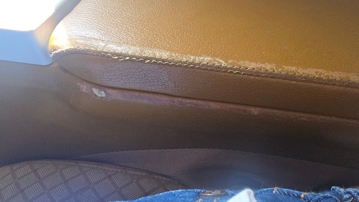 pancy716's tweet photo. The pathetic condition of Air India flight from Delhi to Vancouver in Business class. Broken seats, cracked window, worn out fabric, helpless crew but hey in India it's acceptable coz Jugaad works !! If this was a Euro plane, this would be grounded. 
@airindia @JM_Scindia https://t.co/4G4s1F200K