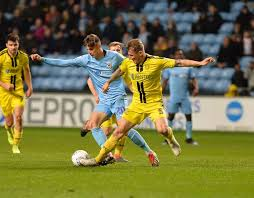 skybluesarchive's tweet photo. On this day 2019 Sky Blues lost 2-1 at home to Burton , Tom Bayliss getting City's goal, Jamie Allen scored one for Burton, Enobakhare was sent off on 53 mins. McFadzean and Collins in Burton defence att. 11,468 https://t.co/zIAyKwarKC https://t.co/OFRSRtcQqz