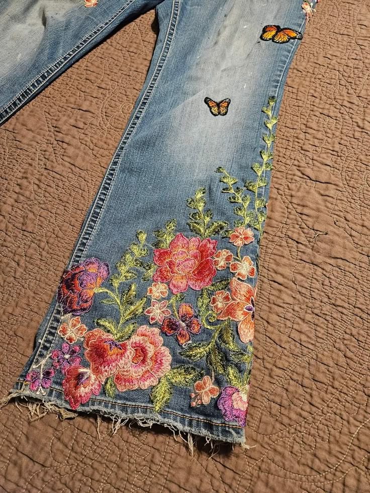 fairyprxncess's tweet photo. it's jeans with pretty flower detailing season https://t.co/OOfhG5hQyM