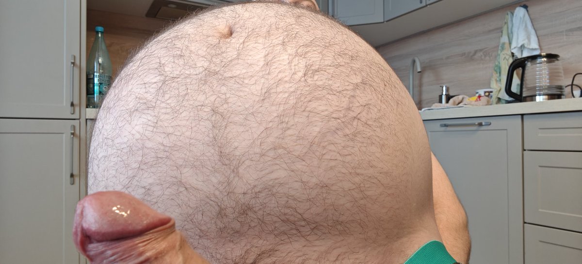 10 massive bananas, 2 liters of Sprite, two cans of peas, and a whole tub of ice cream… and my gut still craves more. Tight, perfectly round, ready to burst from the pressure. Who dares to touch this swollen, hairy balloon? 🍌🥤💦 #BellyInflation #HugeJohnny #GutBusting