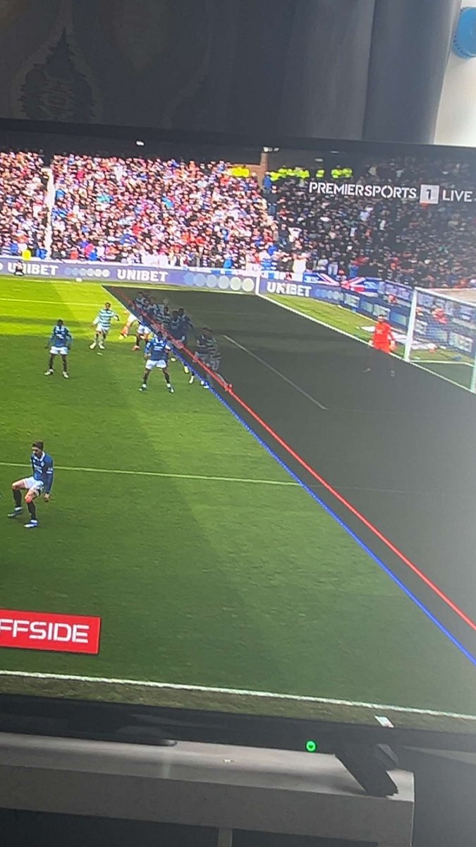 Naw sorry this isn’t acceptable - look the red line , it looks like it’s going through the Rangers defender! 

This is either incompetence or cheating.