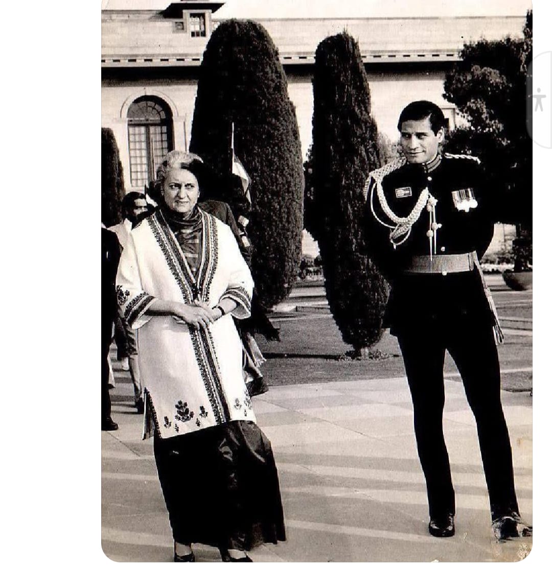 Captain Alok Chandola, ADC to President VV Giri and Fakhruddin Ali Ahmed, from the 12th Battalion of the Brigade of Guards alongside Mrs. Indira Gandhi. I am both surprised and proud of his demeanor; he shows no signs of being intimidated by the presence of the Prime Minister.