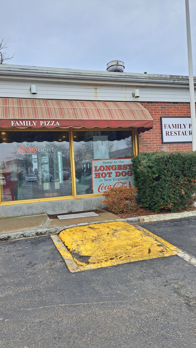So, during lunch today with my family at a restauarant called Family Pizza, I decided to try the "Longest Hot Dog In New England", a 22" behemoth of a hot dog longer than my forearm which I ordered with cheese on it. Even though I only managed to eat half, I still enjoyed it!