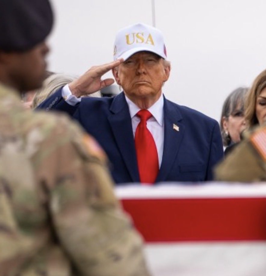 NotAvgLiberal's tweet photo. @WhiteHouse @POTUS @FLOTUS @VP @SLOTUS @POTUS 
This you asshole?

Wearing a fucking baseball cap you sell on your website for $50…

Pro tip asshole…

Honoring America’s fallen soldiers,
Isn’t a fucking marketing campaign.

Disrespectful Prick. https://t.co/TWgQ3QgAfW