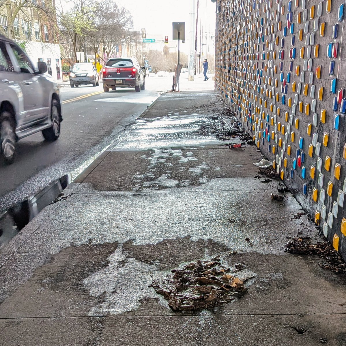 atlurbanist's tweet photo. Is it really a "transit oriented development" when the sole path between the apartments and the transit station constantly looks like this?

King Memorial MARTA Station TOD. 

The City owns the sidewalk, MARTA owns the wall, CSX owns the ground. But no one is "owning" a real fix. https://t.co/BM4vG0B1J4