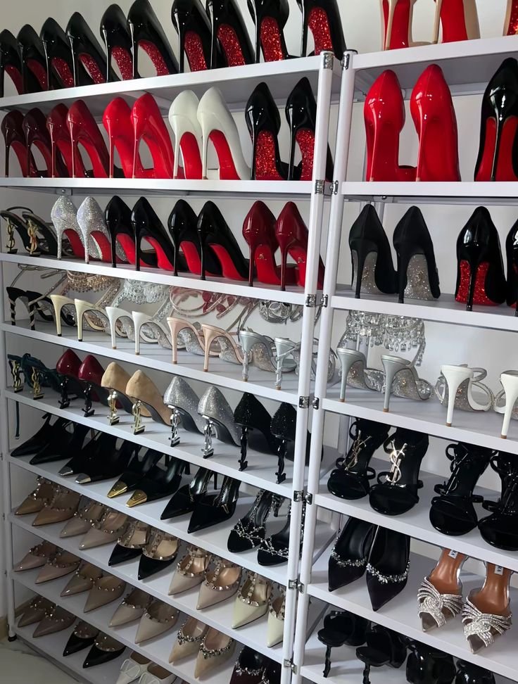 Victoriaa453's tweet photo. This is an impressive collection of high-heeled shoes, showcasing a variety of styles, colors, and embellishments. It reflects a luxurious and fashionable wardrobe, perfect for making a statement with footwear! https://t.co/LFD4piBVTU