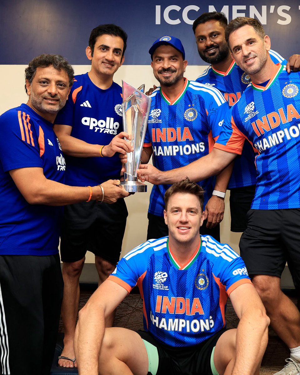 Coaching and support staff with the T20 World Cup trophy. ❤️