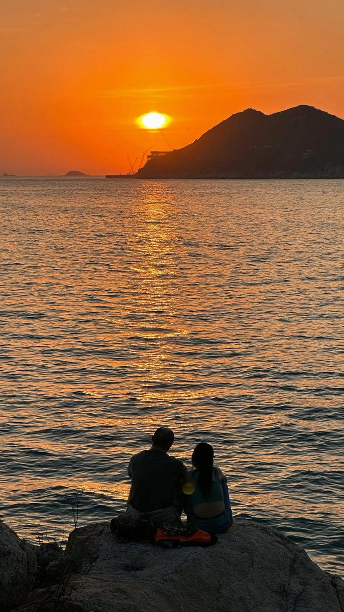 Chasing sunsets over turquoise waters  Stumbled on this hidden cove—no crowds, just the sound of waves u0026 my favorite travel buddy. Perfect end to a sun-soaked day! #Wanderlust #HiddenGem