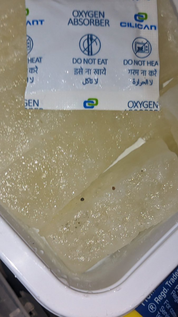Aditya_Agrawa02's tweet photo. @letsblinkit Follow-up to my previous tweet about the contaminated Haldiram’s Petha ordered via Blinkit. Sharing the images here as proof. The box had a pungent smell, tiny black insects inside, and the packaging was wet with a silica gel packet lying with thesweetsORD53478317871 https://t.co/esDuxFcBKd
