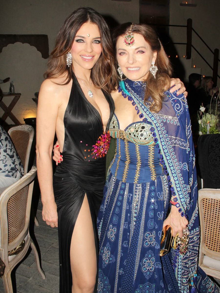 HELLOmagIndia's tweet image. Celebrating #Holi in India with fam &amp;amp; friends, #ElizabethHurley revived a fashion classic—rewearing the iconic #Versace dress she first wore to the #MetGala in 1999. Read more about celebs who found ♥️ at 50: url-shortener.me/GB8I #HELLOIndia #HELLOMagazine @ElizabethHurley
