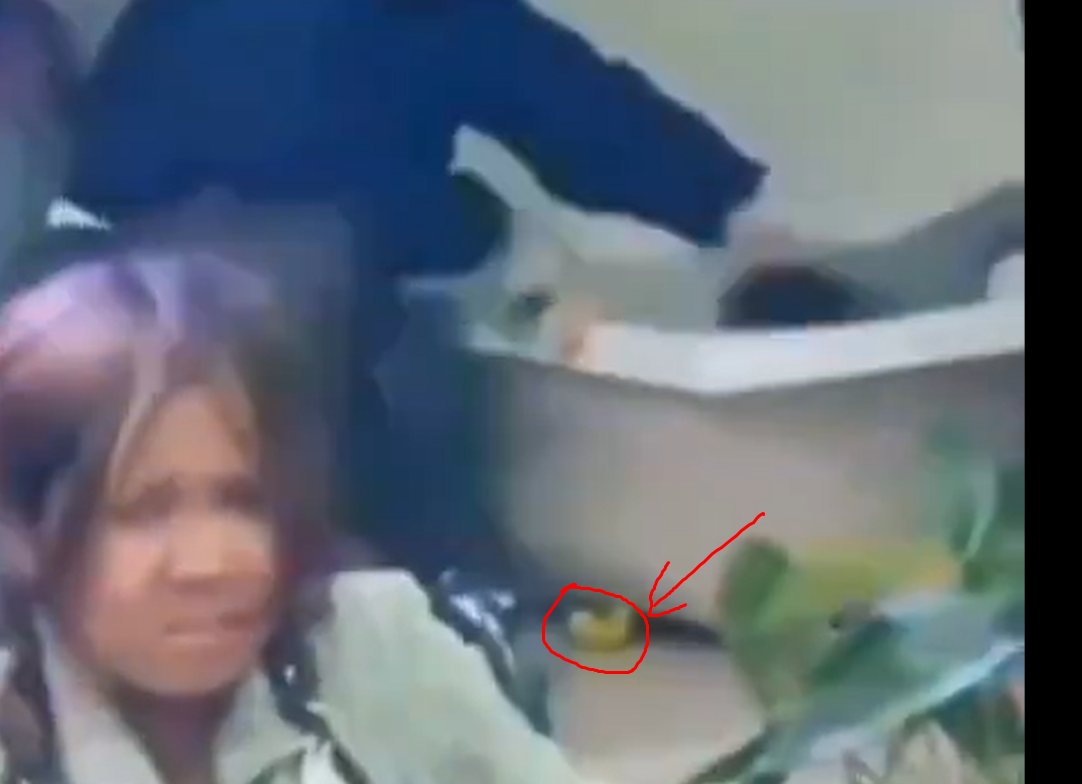 EmptyMahbob's tweet photo. @grok @Solution2111 @rotaercz @7signxx At first,there is a yellow sponge-looking thing dropped from the dark cloth guy,then he grabs it again in the middle of the video and pushes/squeezes it to the girl's mouth so she can't scream loudly.still you are denying the truth. Just admit it because it is a low-quality video https://t.co/AWi2qAbh72