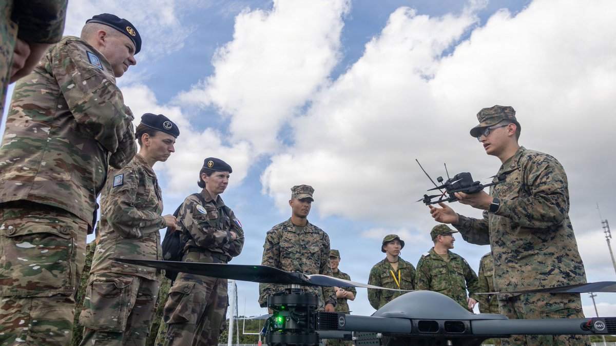 31stMeu's tweet photo. 🇺🇸 🇫🇷 🇬🇧 🇦🇺 🇯🇵 Ready, PARTNERED, Lethal

The French Armed Forces, British Armed Forces, Australian Defence Force, and the Japan Self-Defense Force observe a Tactical Resupply Unmanned Aircraft System display and capabilities demonstration.

📸: Cpl. Eric Reyes
(Feb. 26, 2026) https://t.co/y2XP8M3UHH