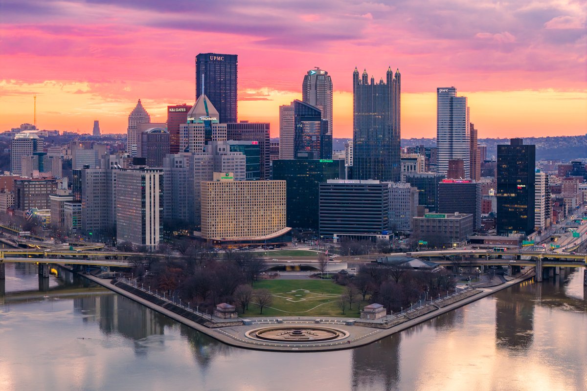 dmcgrew's tweet photo. The clouds behind Pittsburgh light up with vibrant pink and orange color during this past Saturday morning's sunrise. #pittsburgh https://t.co/fNePgv9GKi