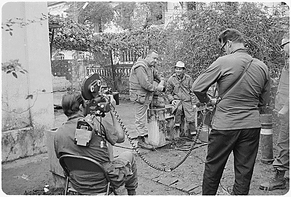 HistoryUnd's tweet image. Walter Cronkite in Vietnam with CBS News, February 1968 (NARA)