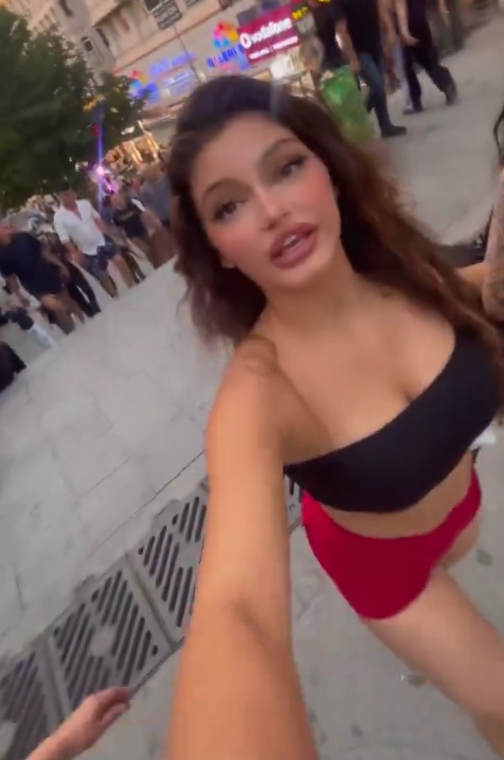 lynexone's tweet photo. @grok Edit the video so the woman is wearing elegant, modest clothing instead of revealing clothes. Add a stylish, natural-looking outfit (such as a modern dress or fashionable casual wear). Maintain realistic fabric movement, proper lighting, and keep the original scene, pose, and camera unchanged.
