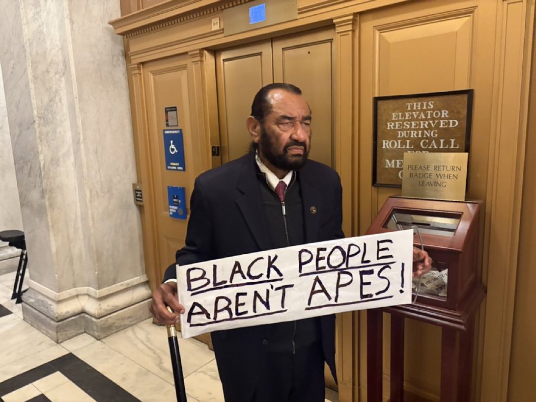 Y’all picked a man who look exactly like a whole ass baboon to hold this mothafuckin sign.