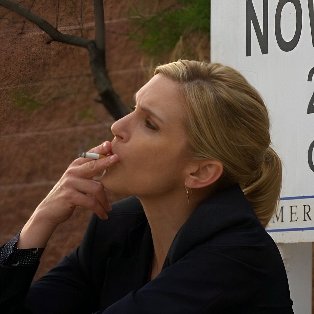oh to smoke a cigarette with her