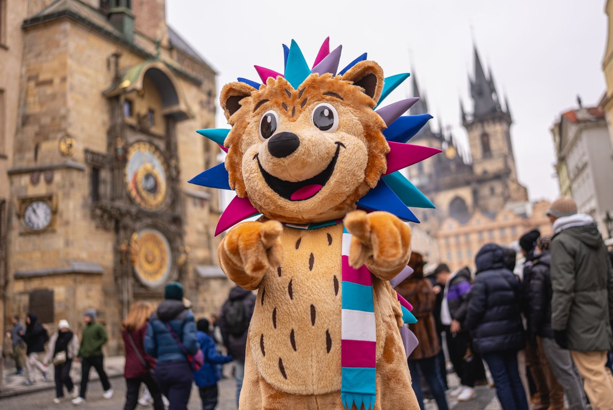 PragueEU's tweet photo. 🦔 Eda the Hedgehog, the 2026 ISU Worlds official mascot, left his ice rink for Prague towers. 
In March, 🌍 Prague will become centre of ⛸️ world. Top level sport ➕ gorgeous setting ➡️ unforgettable experience!
👉🏼 https://t.co/PKMEyH8vQ3
👉🏼 https://t.co/LKE8C7uhmr https://t.co/aIvbCwXiXv