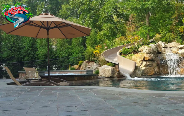 Parents, picture this: You are lounging under the shade with a cool drink, while the kids zip down our Paradise Slides water slide into the pool—endless giggles without a worry! Create your ultimate relaxation zone with built-in thrills.🍹🌊🛝 Relax and slide into paradise at