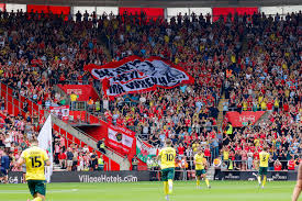 SOTK1864's tweet photo. Pre-match vs @ChelseaFC : Honouring Sir Joey Jones, we need a volunteer to grab the surfer flag and lead it down the Mold Road Stand! Lets make it epic for Mr Wrexham himself! Anyone up for helping.. DM Reds!❤️🔴⚪️ #UTST #SirJoey https://t.co/TaukwCTQfG