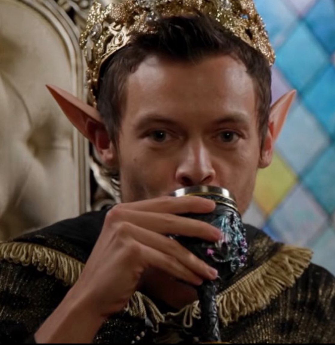 this is exactly how I’d be looking at Satan whilst he goes through my ao3 history blushing af