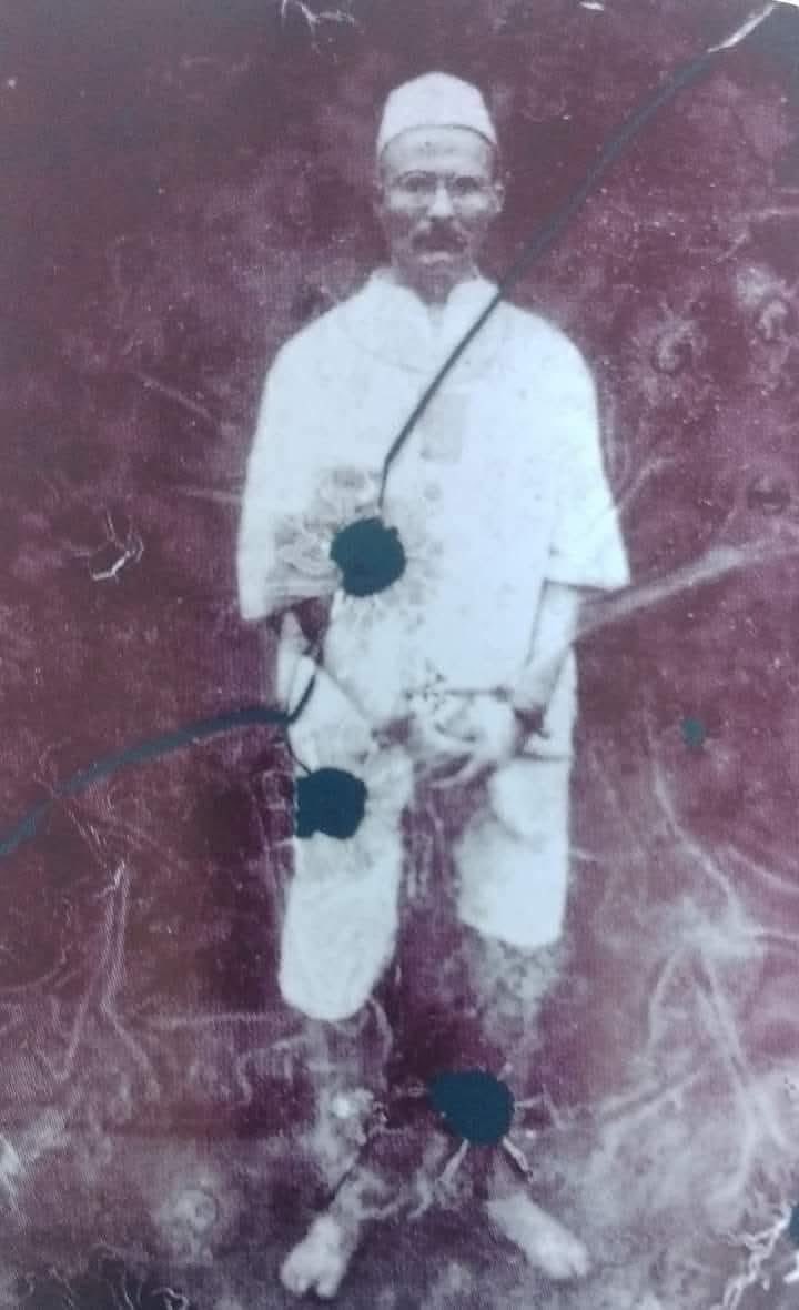 The hands of this man appearing in the photo are shackled with handcuffs &amp; feet tied up with chains. The photo taken by BBC in 1924 when he was being released from 14 years inhuman, torturous "Kala Pani”. The British Empire kept him in house arrest confinement for next 13 years.