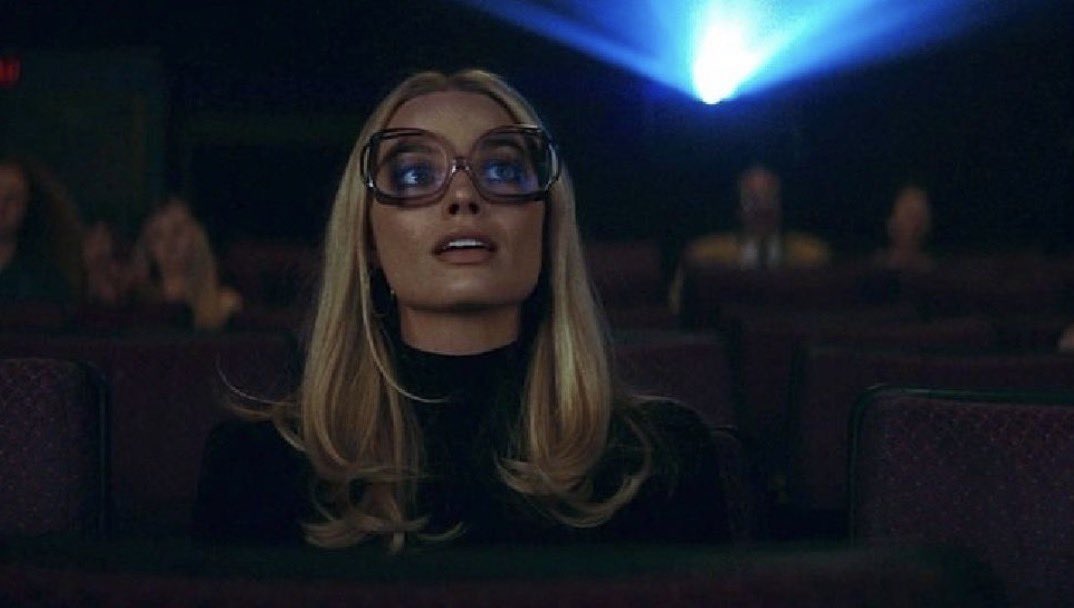 watching a movie in theaters