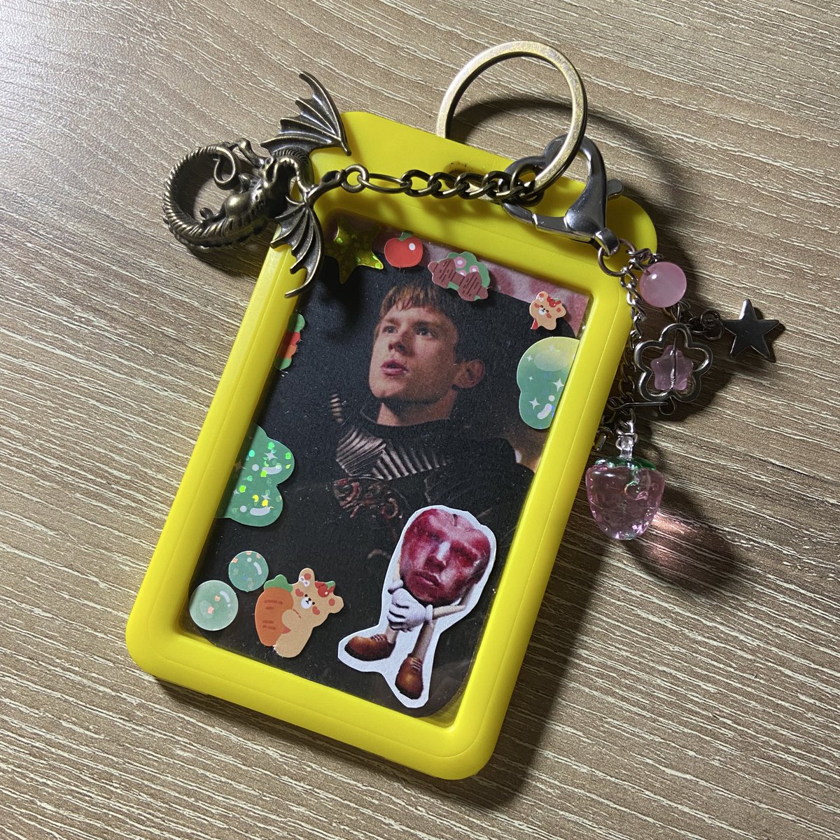 he has cute lil stickers and a dragon as he should