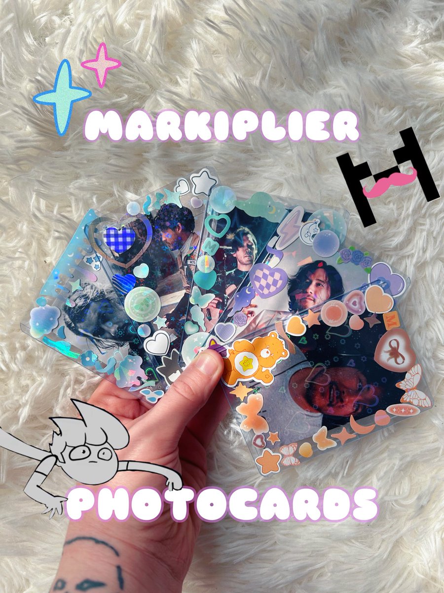 my half alive, heated rivalry, sleep token, markiplier, ghost, and djo photocards will be dropping on my etsy shop THIS FRIDAY 2/27 !! 

various photo options will be available, all made with holographic sleeves, top loaders, and super cute stickers to show off your favs !! <3