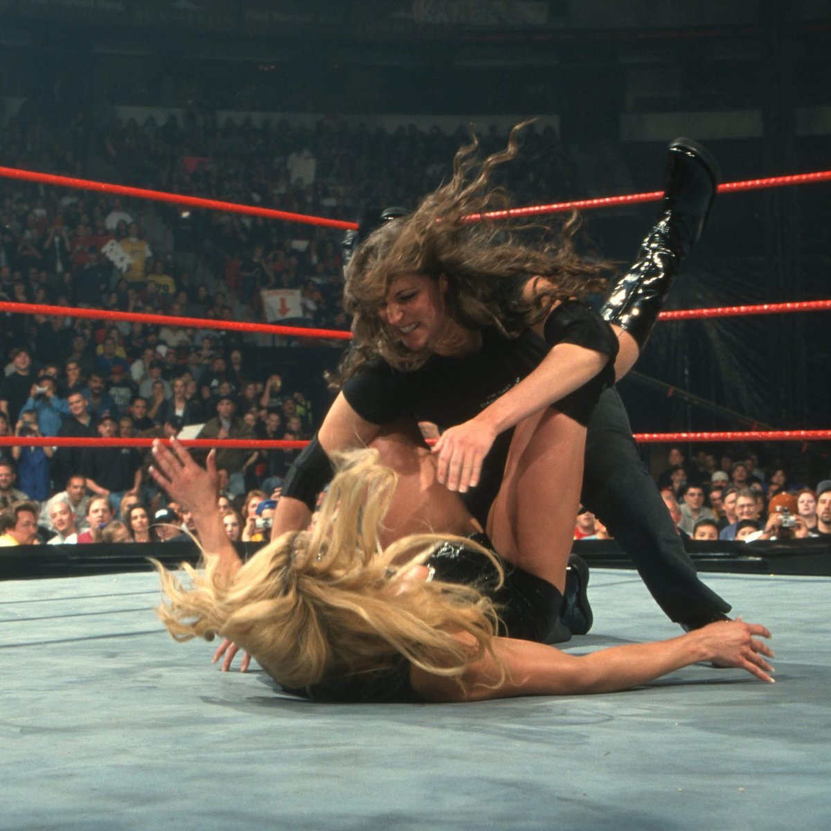 The WWE pay-per-view No Way Out takes place in Paradise, Nevada. 

HHH Defeats Stone Cold Steve Austin in a 3 Stages of Hell matchup, which finishes their feud for now. 

Also The Rock beats Kurt Angle, ending a five-month title reign and changing the Main Event of WrestleMania