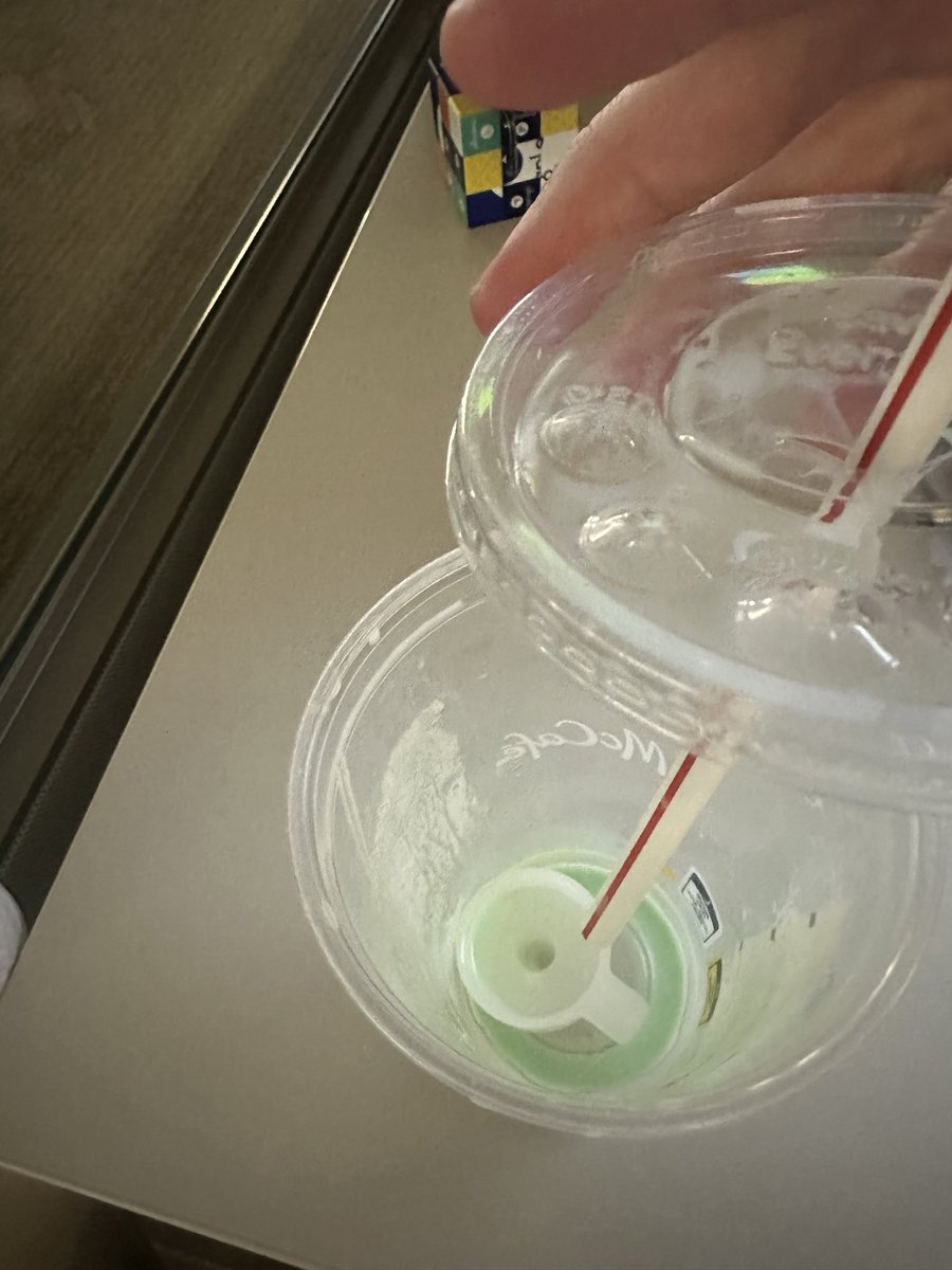 andrusmitchell's tweet photo. Nice to know the @McDonalds Shamrock Shake now comes with a side of "choking hazard." Found a plastic piece from the machine in my cup today. Is this the new "limited time" ingredient? Do better. 🤢👋 https://t.co/MXJpExuVTC