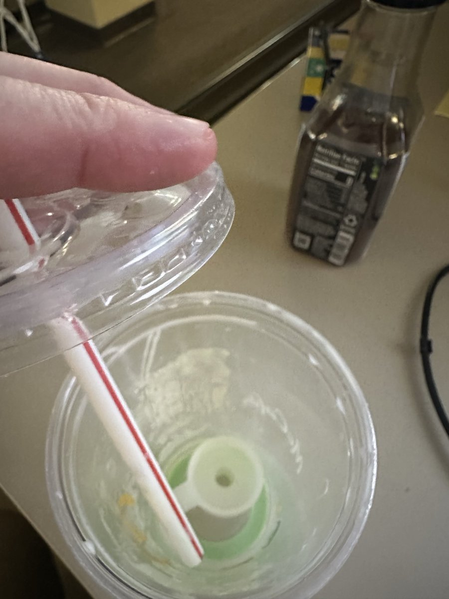 andrusmitchell's tweet photo. Nice to know the @McDonalds Shamrock Shake now comes with a side of "choking hazard." Found a plastic piece from the machine in my cup today. Is this the new "limited time" ingredient? Do better. 🤢👋 https://t.co/MXJpExuVTC