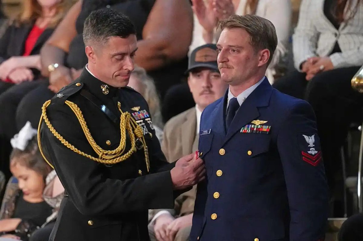 NavalInstitute's tweet photo. At the State of the Union, Petty Officer Scott Ruskan, a U.S. Coast Guard rescue swimmer, was honored with the Legion of Merit for saving 165 lives during the 2025 Texas floods.

A powerful and well-deserved tribute to his courage and selfless service. 🇺🇸🚁 https://t.co/x0u4kENSBg