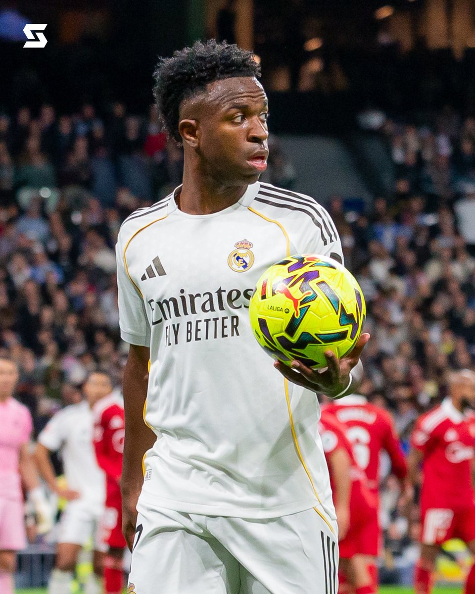 SportScorecom's tweet photo. 🚨 REAL MADRID ADVANCES WITHOUT MBAPPÉ

Final: Real Madrid 3-1 Benfica (agg)

Kylian Mbappé sat out with a knee injury (will miss "a while" per manager), but Madrid still got the job done! 🙌

Aurélien Tchouaméni (first goal of the season!) and Vinícius Júnior found the net to send Real through. They'll face either Sporting or Man City in the Round of 16.

Also in this tie: Benfica's Gianluca Prestianni was provisionally suspended by UEFA after accusations of directing a slur at Vinícius in the first leg. Madrid fans displayed a powerful "No to racism" tifo before kickoff.