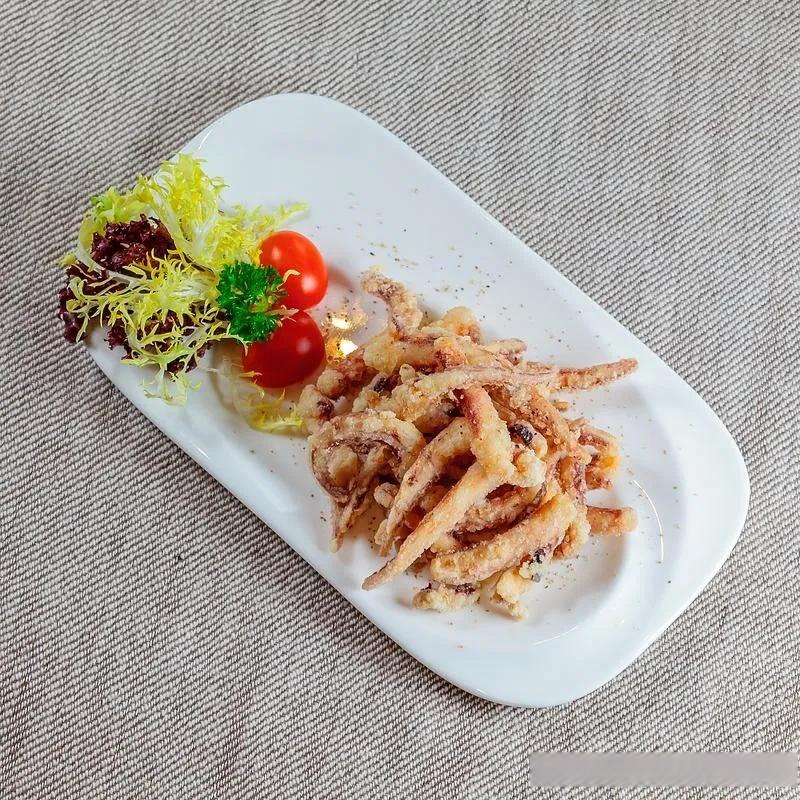 KevenWinter_'s tweet photo. Tried the crispy salt u0026 pepper squid at Ocean Bite tonight—tender inside, crunchy outside, with a hint of chili kick! Perfect with their garlic butter noodles. 10/10 for coastal vibes u0026 flavor. https://t.co/O3ktycH05g