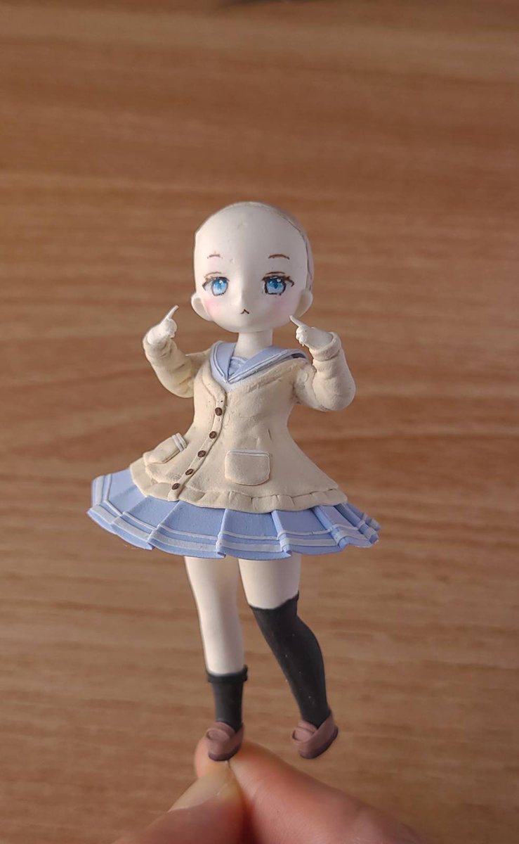 Continue working on Neuro.

I’m attaching her arms to her body and using superglue to secure them.

Once the glue sets, there’s no going back.

Just before I apply the glue, I hear a mysterious voice:

Mystic voice: That looks stupid. Turn her right elbow half a millimeter