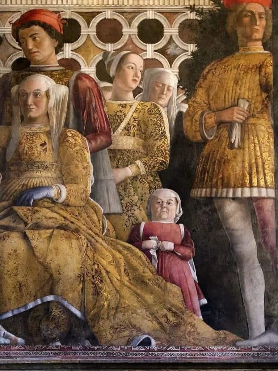 Within the painted architecture of the Camera degli Sposi, Mantegna constructs a world that seems absorbed in its own courtly rituals. But then Lucia the dwarf appears. While everyone else remains locked within the painted fiction, she looks out toward us with an unsettling gaze.