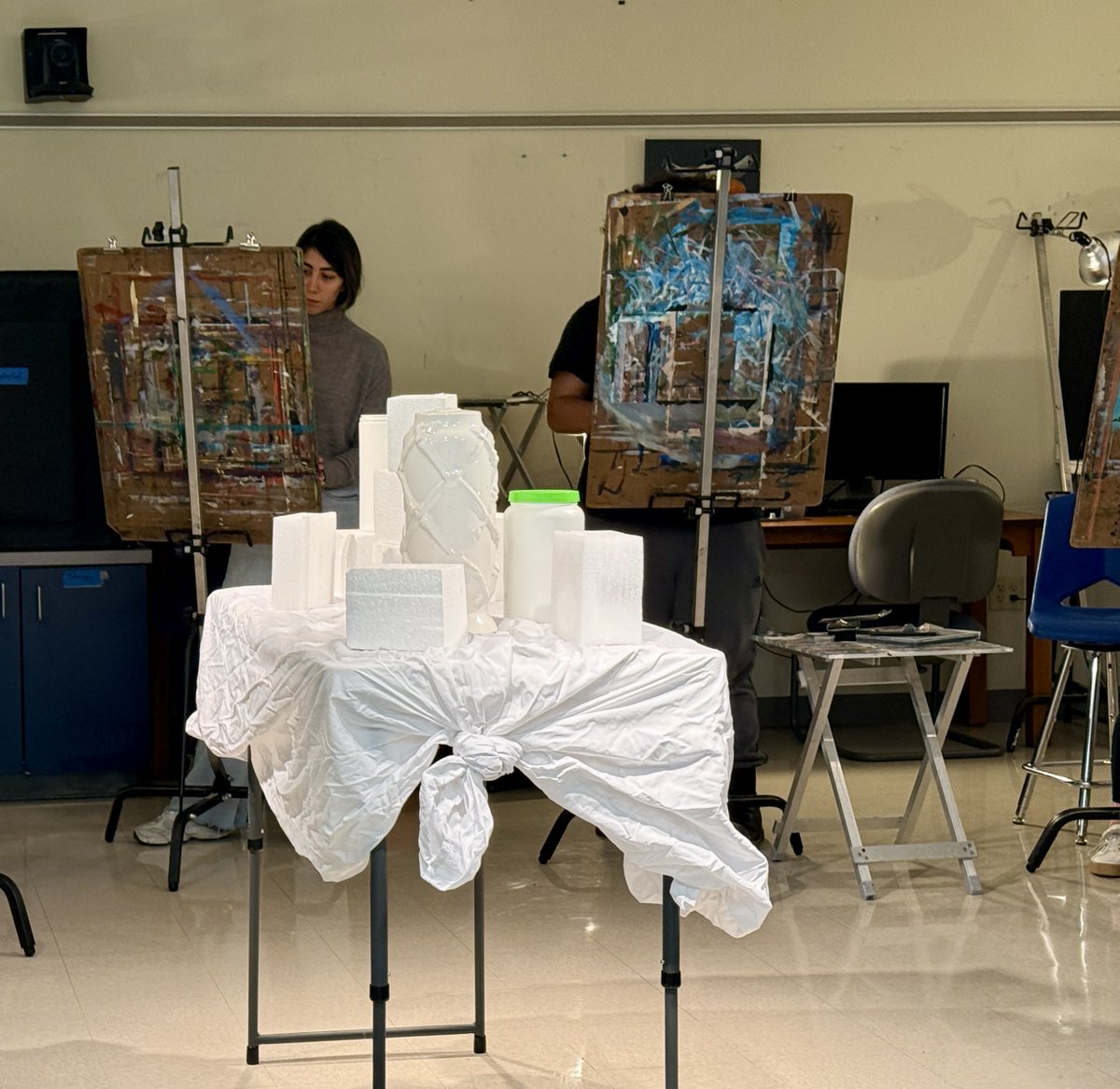 Students often work on drawing still life from observation in Drawing I (ARTS 1316) class. Still life drawing uses objects in an intentional arrangement. These class exercises teach exploration of composition while focusing on elements like form, light, and texture. ✏️