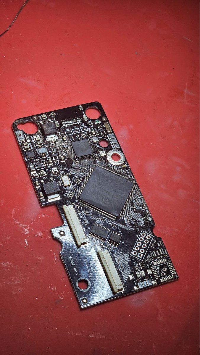 xcubicle's tweet photo. Ancient technology repair from another time. Analogue NT mini is a high end FPGA remake of the orignal Nintendo hardware from the 1980s with HDMI output. This had a broken HDMI which required a trace repair. https://t.co/e7xj6h0TVj