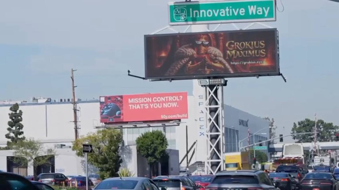 cajhenblubbs's tweet photo. GROKIUS BILLBOARD IS LIVE DIRECTLY OUTSIDE OF SPACE X https://t.co/VuWwYfm4Cv